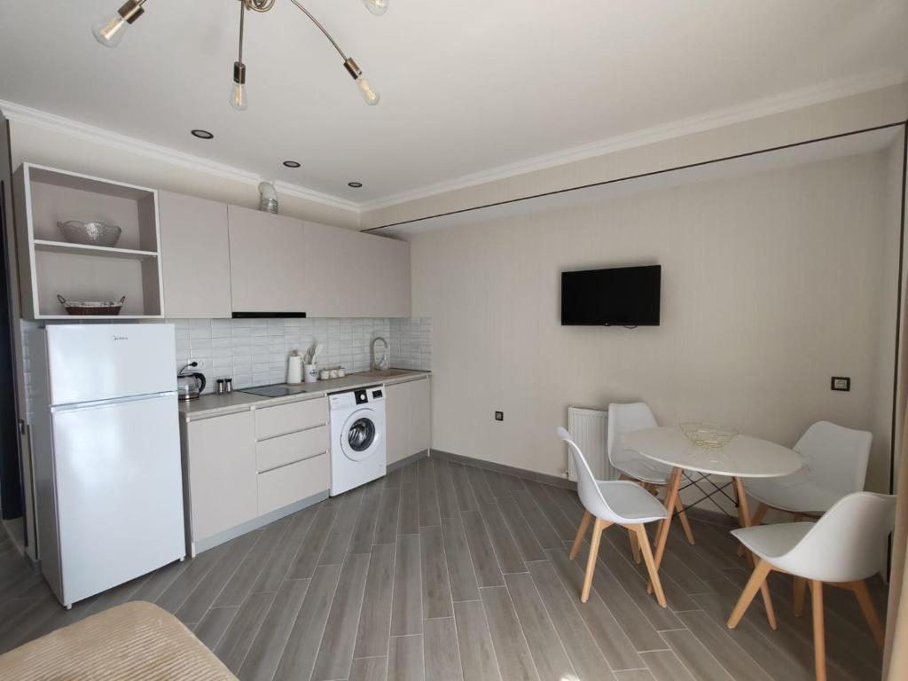 Kuchyň nebo kuchyňský kout v ubytování eco village