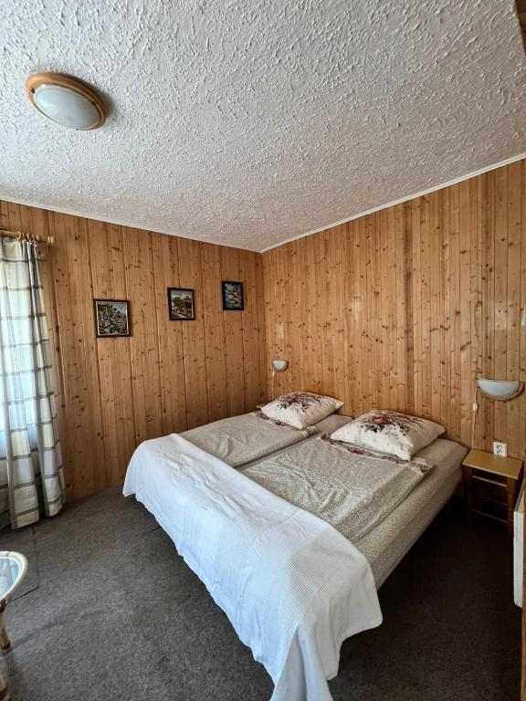 Postel nebo postele na pokoji v ubytování Apartmány Merkel