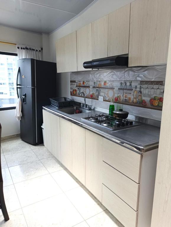 Köök või kööginurk majutusasutuses Comodas y agradables Habitaciones en Chipre
