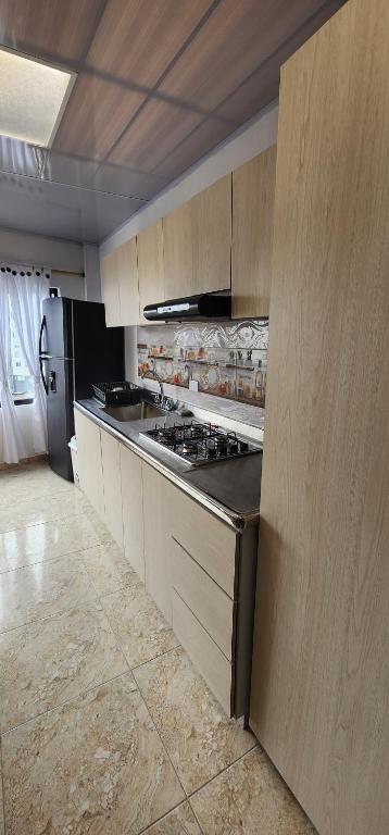 Köök või kööginurk majutusasutuses Comodas y agradables Habitaciones en Chipre