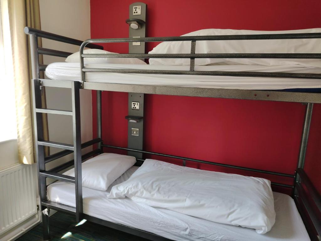 Postel nebo postele na pokoji v ubytování YHA Malham