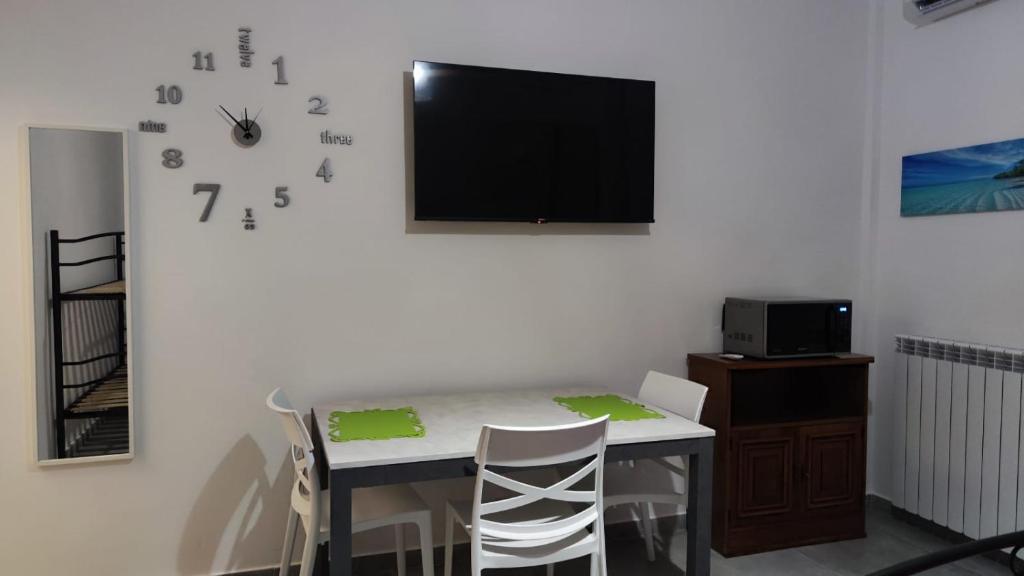 TV a/nebo společenská místnost v ubytování Relax Apartment Bergamo