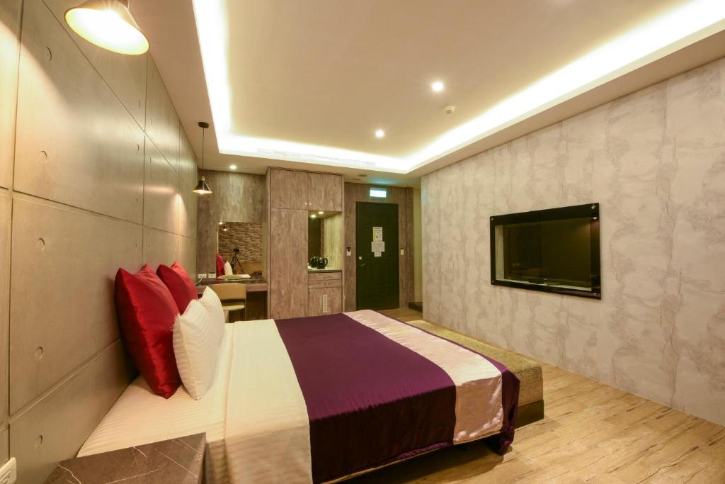 TV a/nebo společenská místnost v ubytování Belle Song Motel