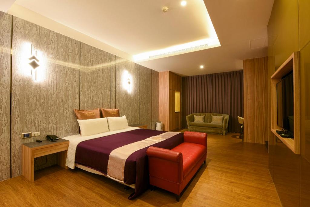 Postel nebo postele na pokoji v ubytování Belle Song Motel