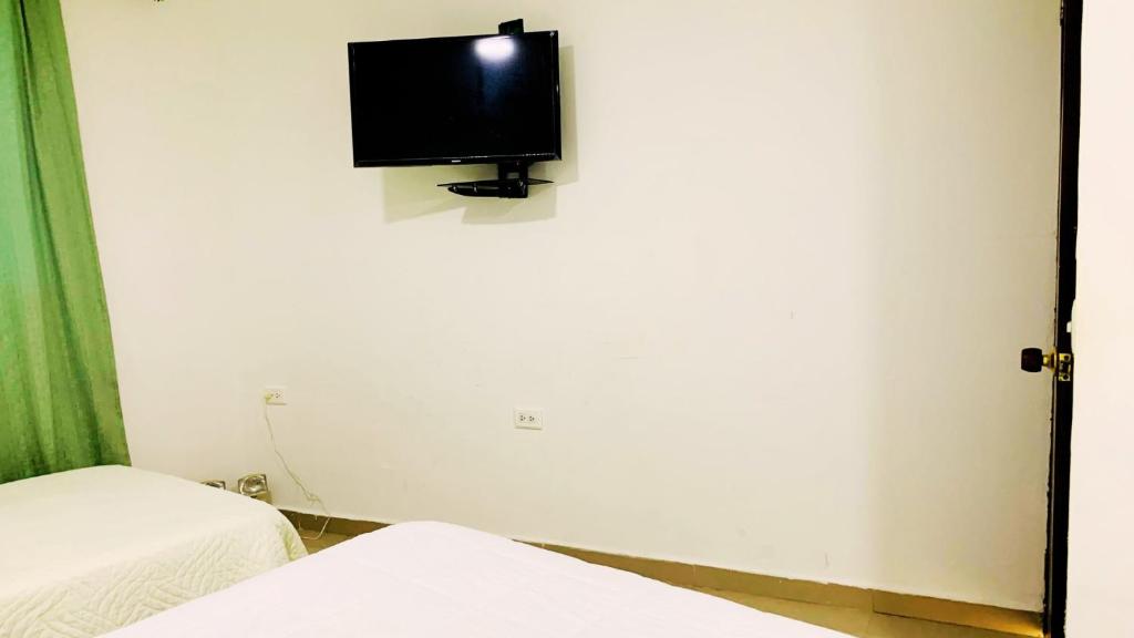TV a/nebo společenská místnost v ubytování Apartahotel Bahia Tropical III