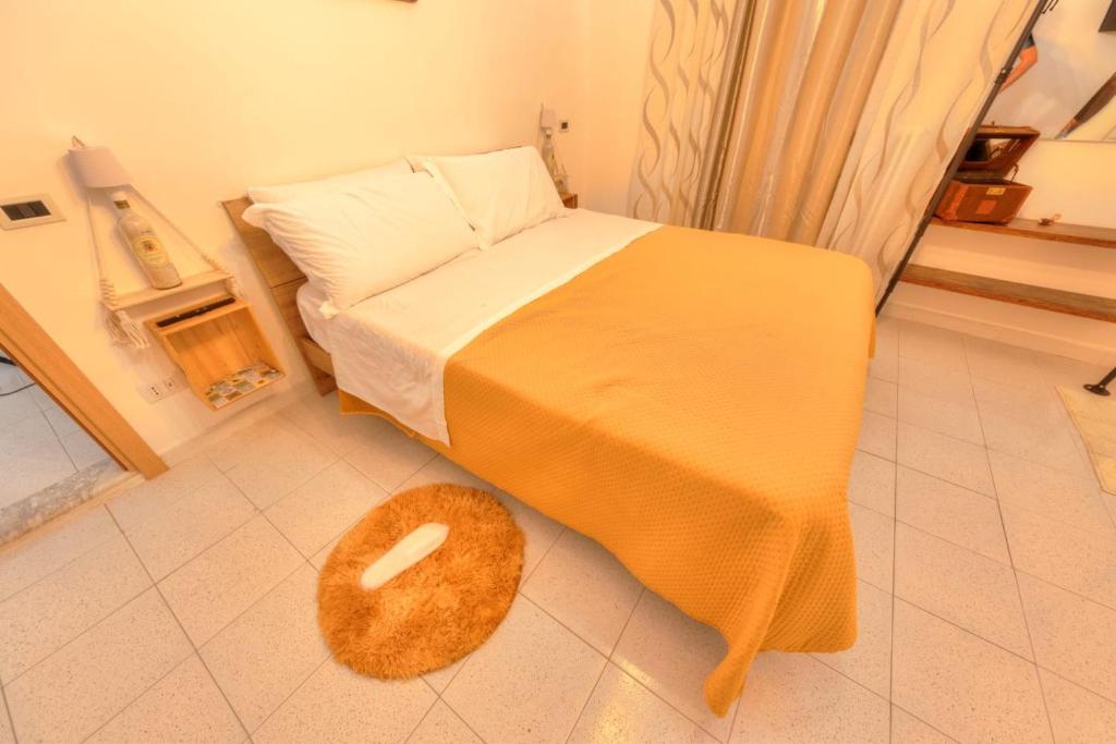 Postel nebo postele na pokoji v ubytování L'altalena sui Sassi