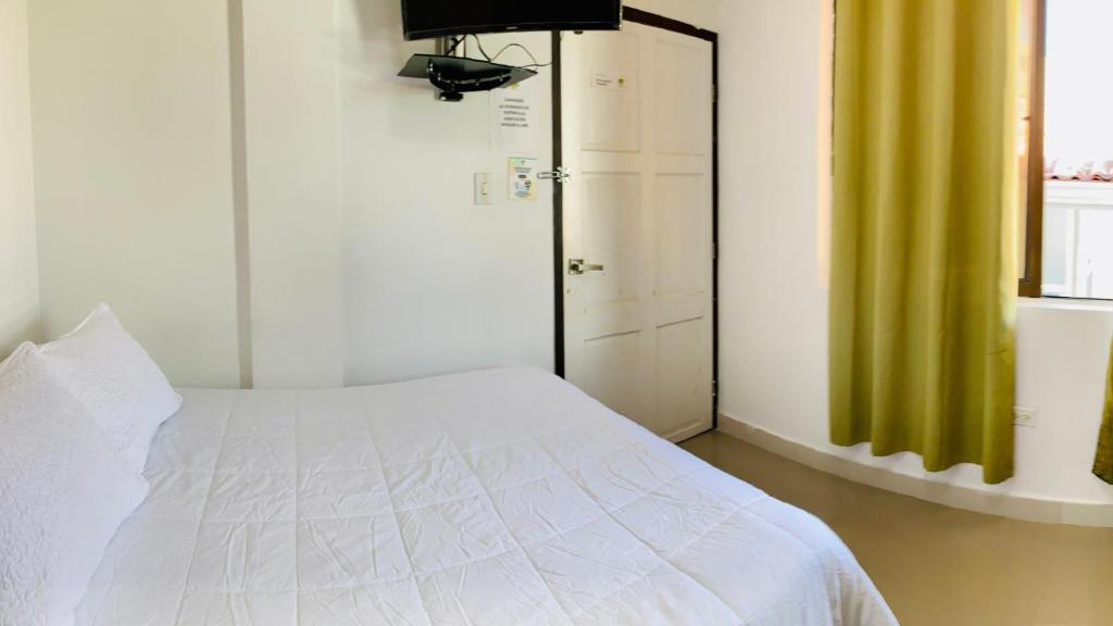 Postel nebo postele na pokoji v ubytování Apartahotel Bahia Tropical III