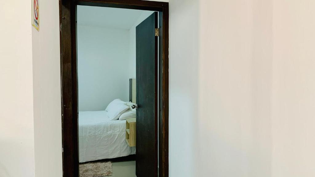 Postel nebo postele na pokoji v ubytování Apartahotel Bahia Tropical III