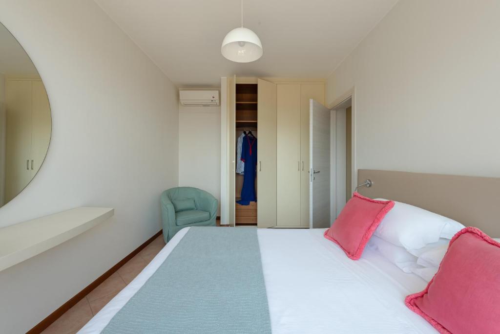 Łóżko lub łóżka w pokoju w obiekcie Il Sogno Apartments