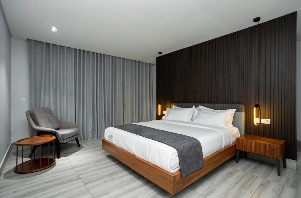 Postel nebo postele na pokoji v ubytování Space Quality Apart Hotel