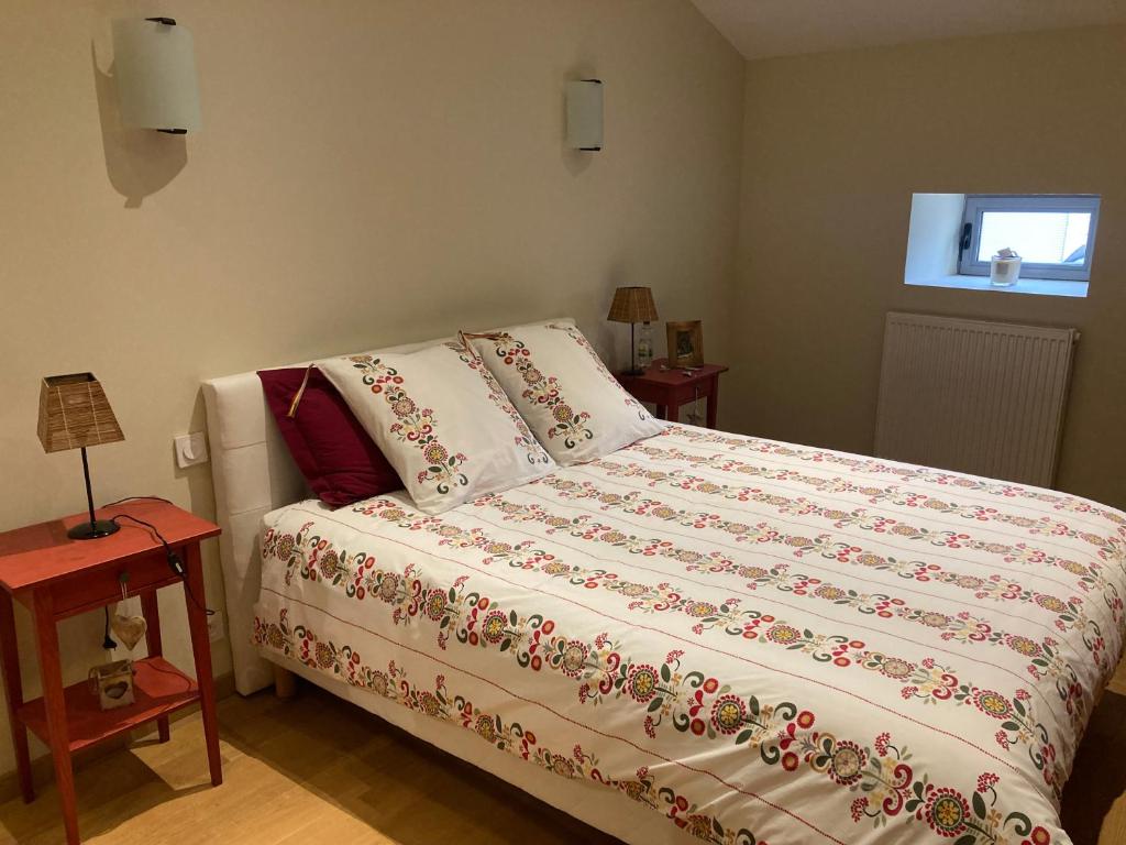 Ένα ή περισσότερα κρεβάτια σε δωμάτιο στο le domaine de mazerolles