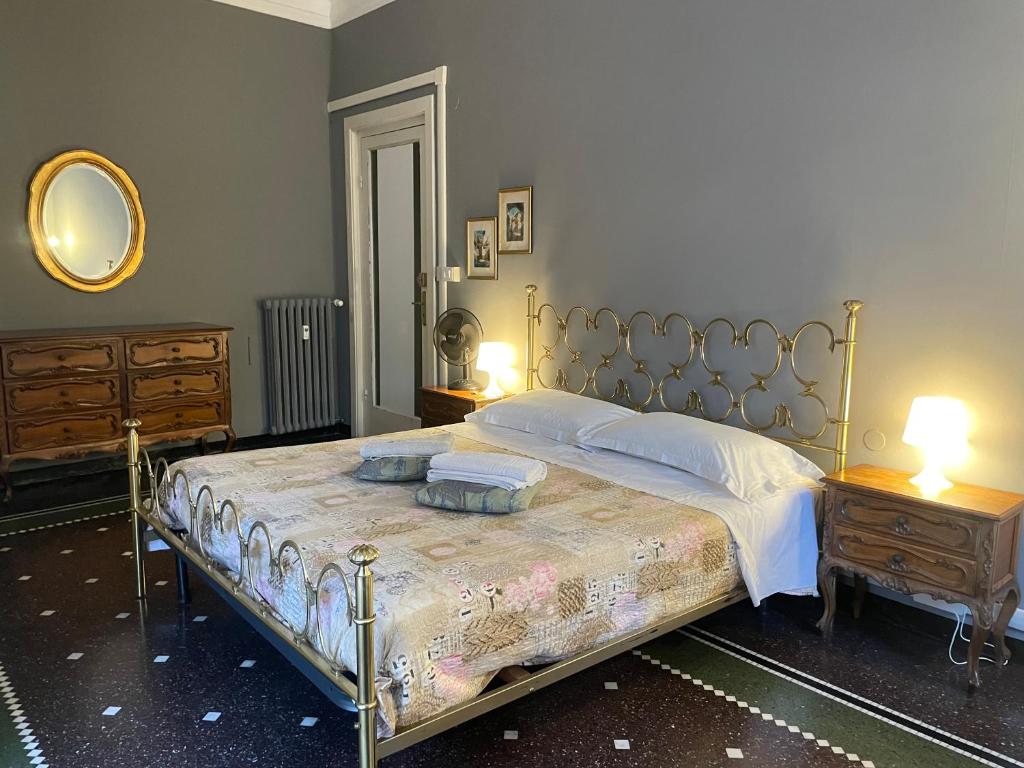 Posteľ alebo postele v izbe v ubytovaní GASTALDI ROOMS - Old Style