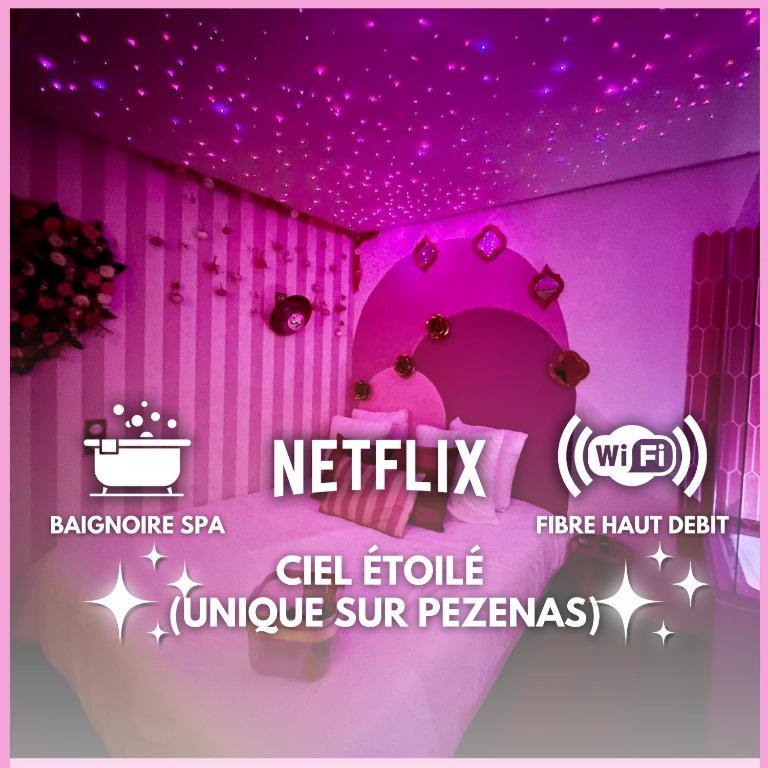 une chambre avec un plafond rose et un panneau indiquant le fluorure cellulaire netkritk dans l'établissement Romantic Room - Balnéo - Ciel Etoilé - Free Wifi - Netflix - Hyper Centre, à Pézenas