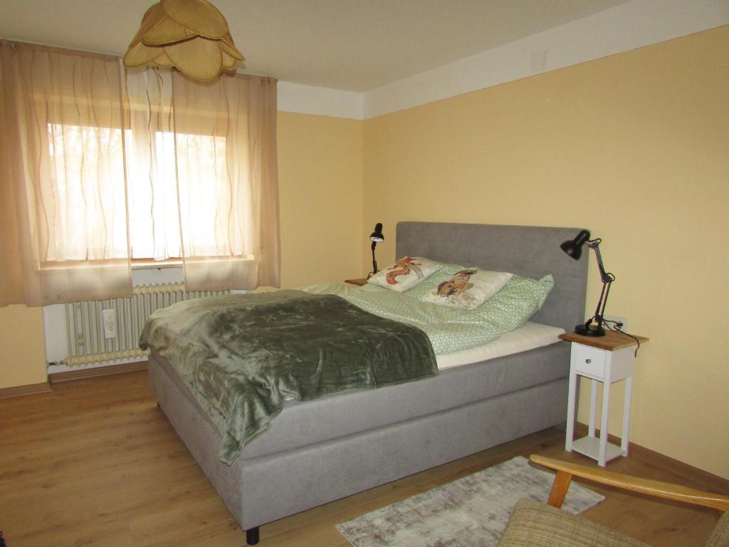 Ένα ή περισσότερα κρεβάτια σε δωμάτιο στο Ferienhaus Ulrich