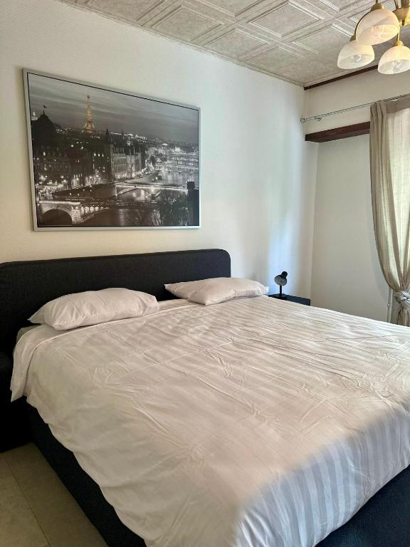 Postel nebo postele na pokoji v ubytování Casa Foetz