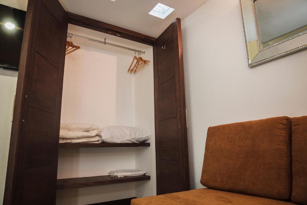 Postel nebo postele na pokoji v ubytování Hotel Platino Expo Guadalajara