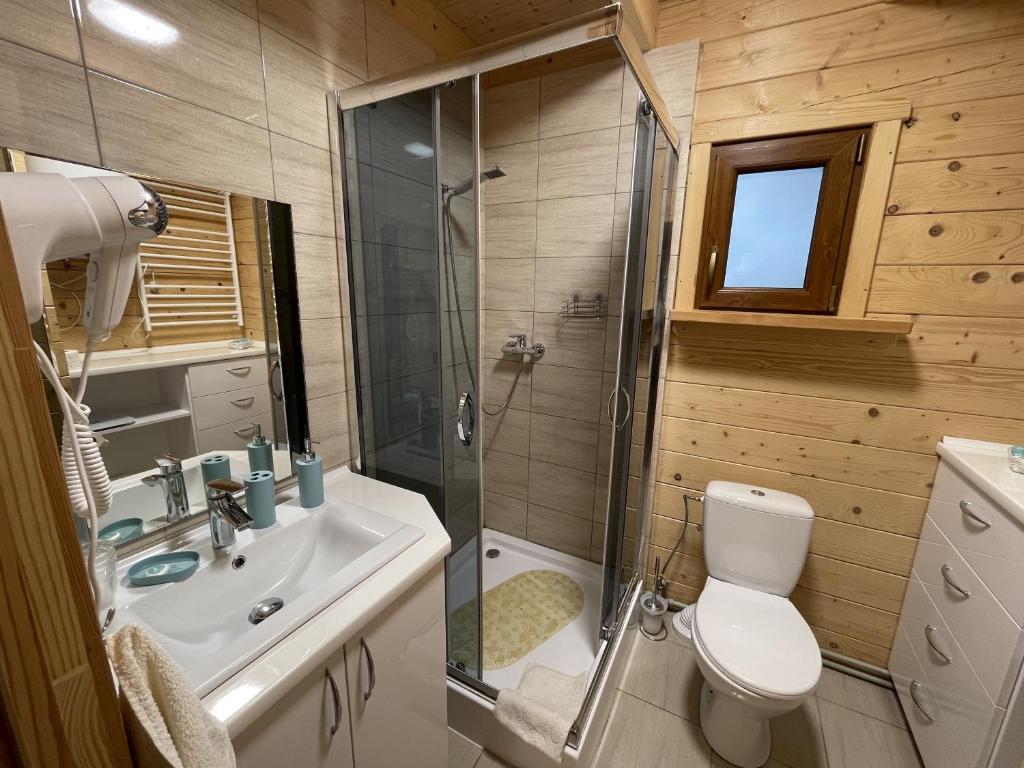 Kúpeľňa v ubytovaní Zagroda Cztery Wiatry