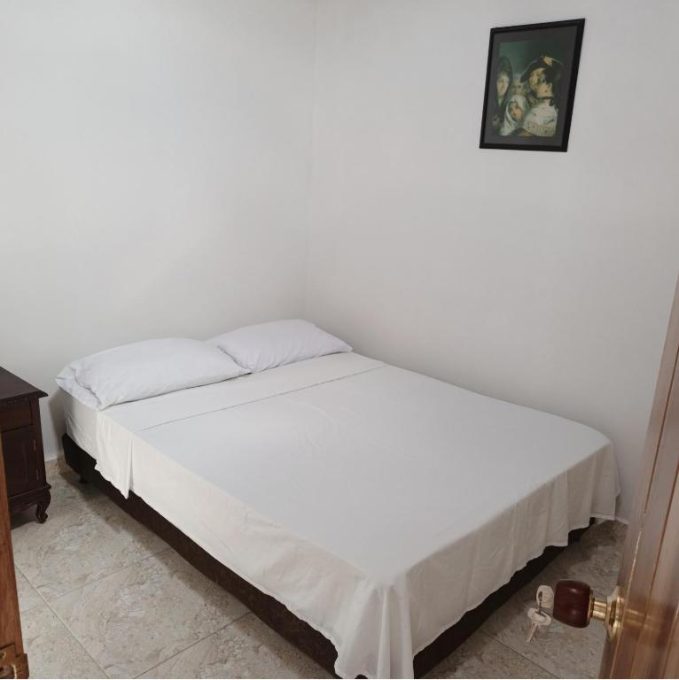 Voodi või voodid majutusasutuse Comodas y agradables Habitaciones en Chipre toas