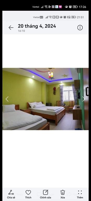 Postel nebo postele na pokoji v ubytování MOTEL WIN PHÁT