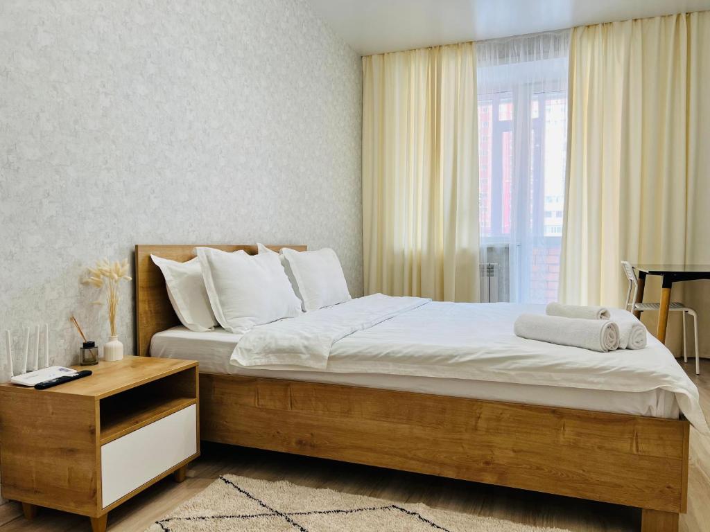 Postel nebo postele na pokoji v ubytování Апартаменты Костанай Жана Кала ВИП