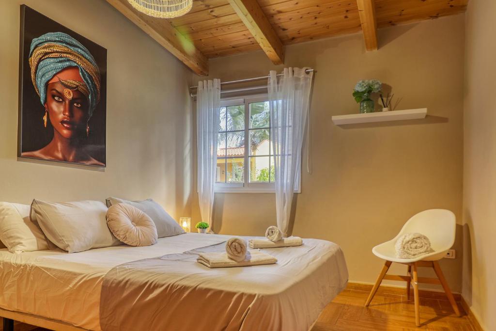 Cama o camas de una habitación en Casa Vista Teide con Jardín, Barbacoa y Fuente Zen