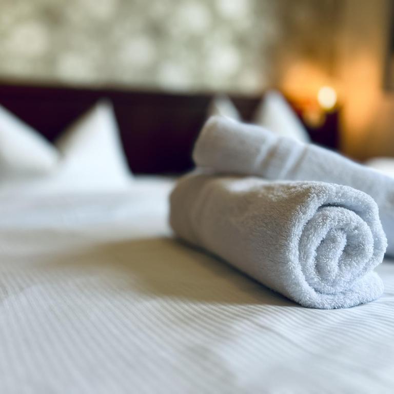 Postel nebo postele na pokoji v ubytování IKURA Hotel Self-check-in
