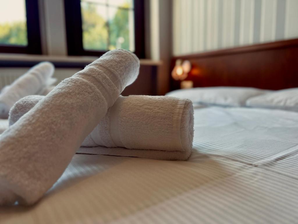 Postel nebo postele na pokoji v ubytování IKURA Hotel Self-check-in
