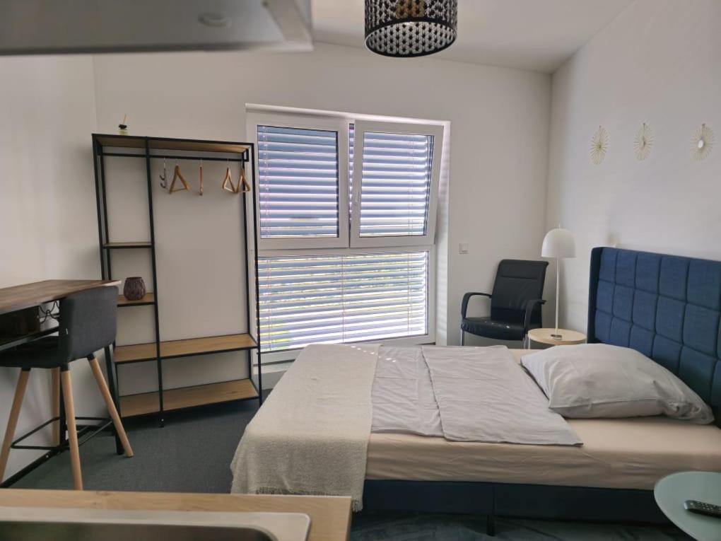 Postel nebo postele na pokoji v ubytování Alisaarigent Apartment