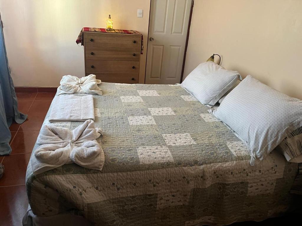 Postel nebo postele na pokoji v ubytování Habitación Quyllur Ancestral