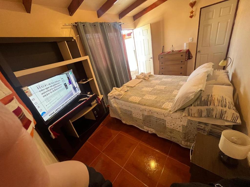 Postel nebo postele na pokoji v ubytování Habitación Quyllur Ancestral