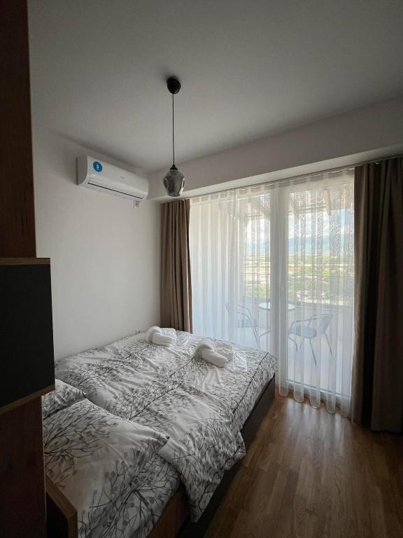 Krevet ili kreveti u jedinici u okviru objekta OpenView Apartment