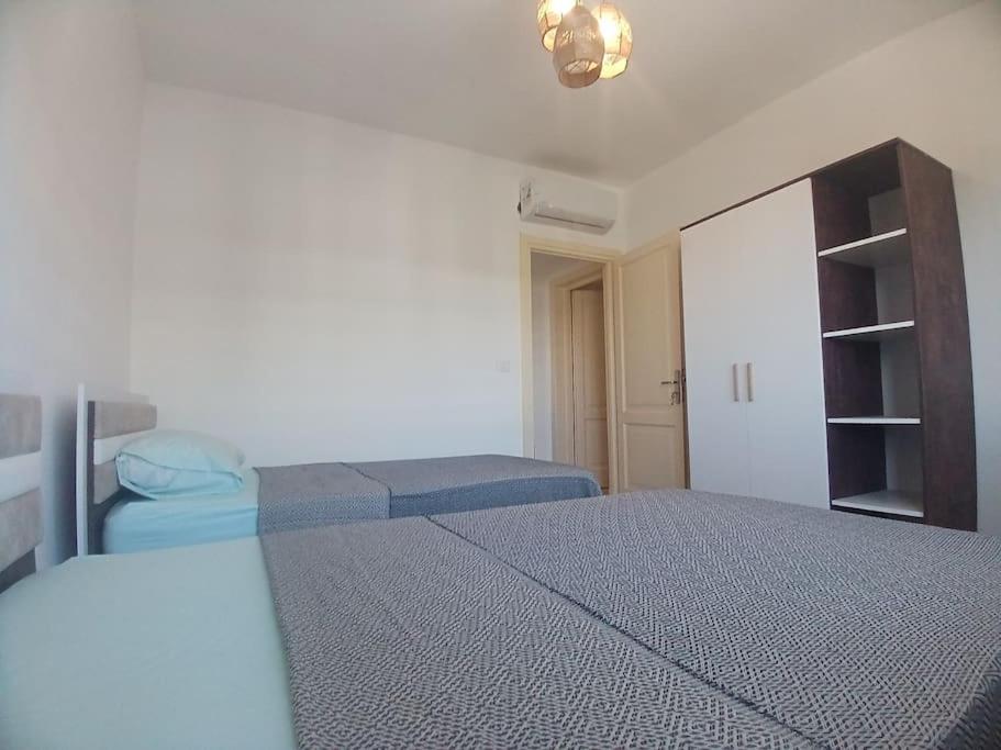 Postel nebo postele na pokoji v ubytování Madinaty Modern Home