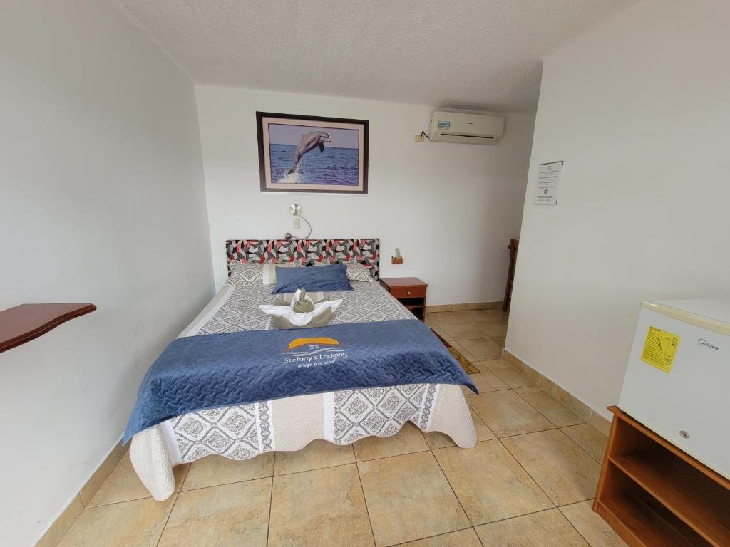 Postel nebo postele na pokoji v ubytování Stefany's Lodging