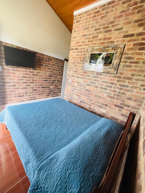 Postel nebo postele na pokoji v ubytování Hotel Paraíso Moniquira