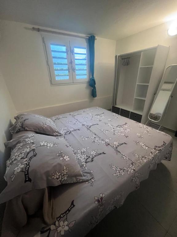 Postel nebo postele na pokoji v ubytování Logement Campagne Coquelicots Plaisance