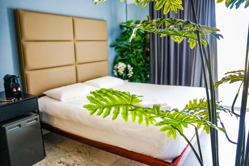 Postel nebo postele na pokoji v ubytování Valhalla Boutique Hotel