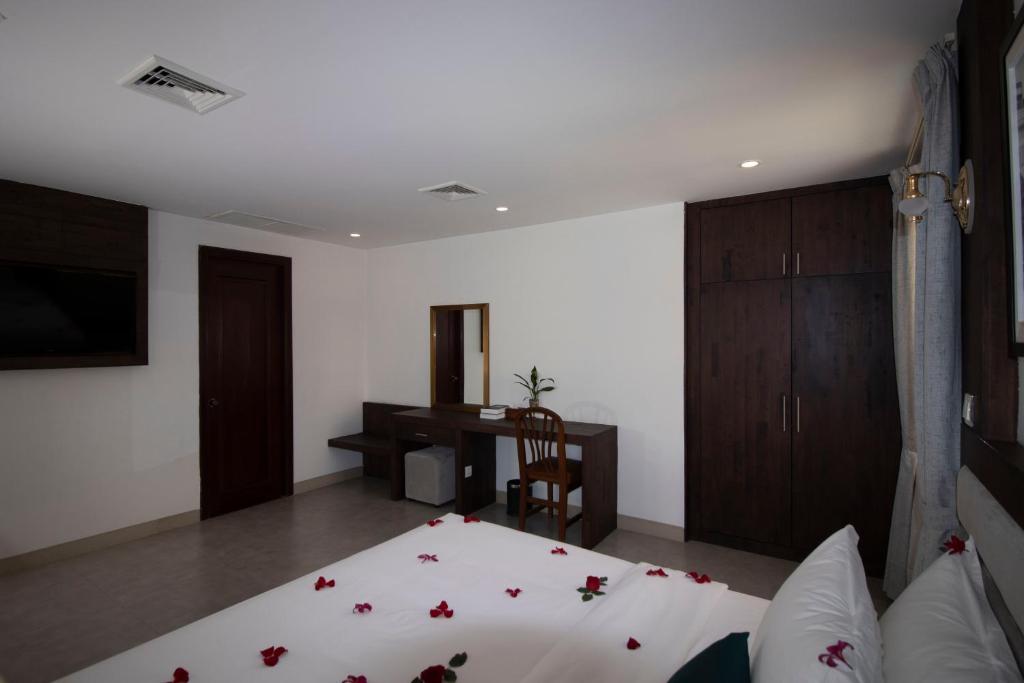 Postel nebo postele na pokoji v ubytování Vrest Hotel
