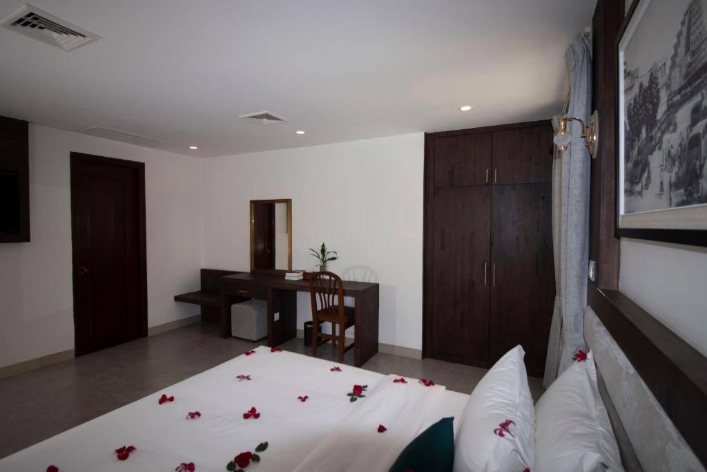 Postel nebo postele na pokoji v ubytování Vrest Hotel