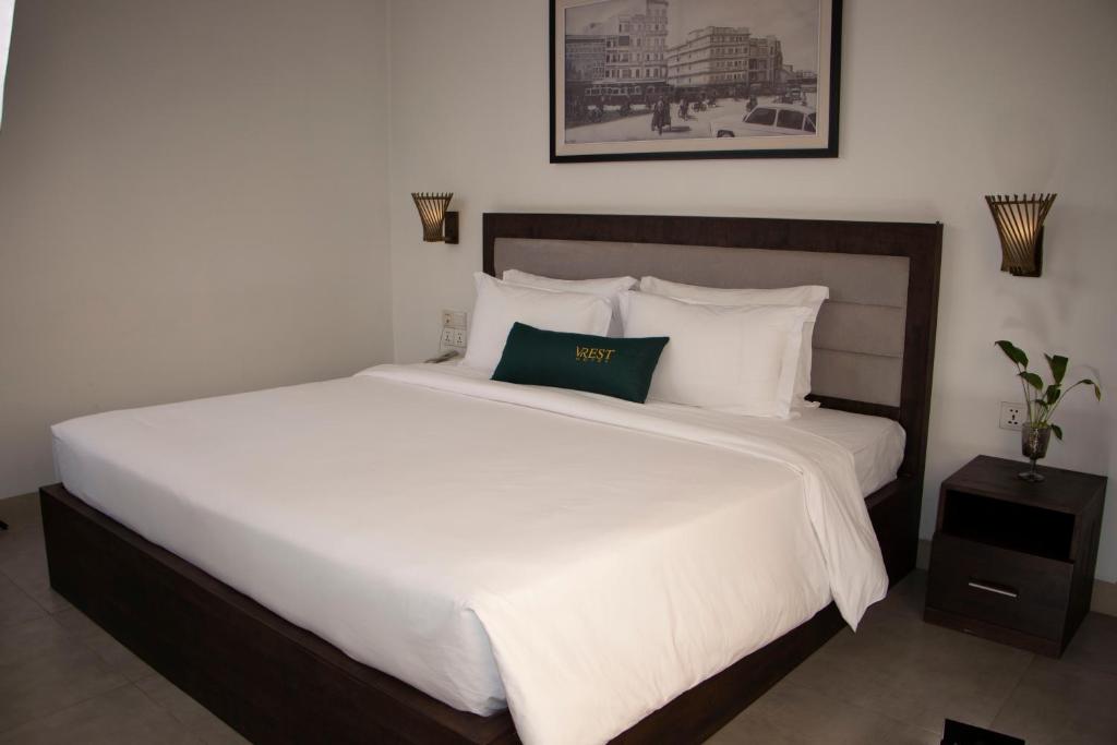 Postel nebo postele na pokoji v ubytování Vrest Hotel