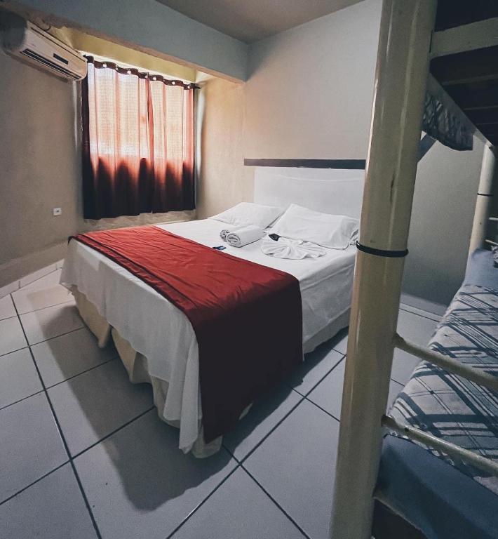 Postel nebo postele na pokoji v ubytování Hotel Morada de Leste Pontal