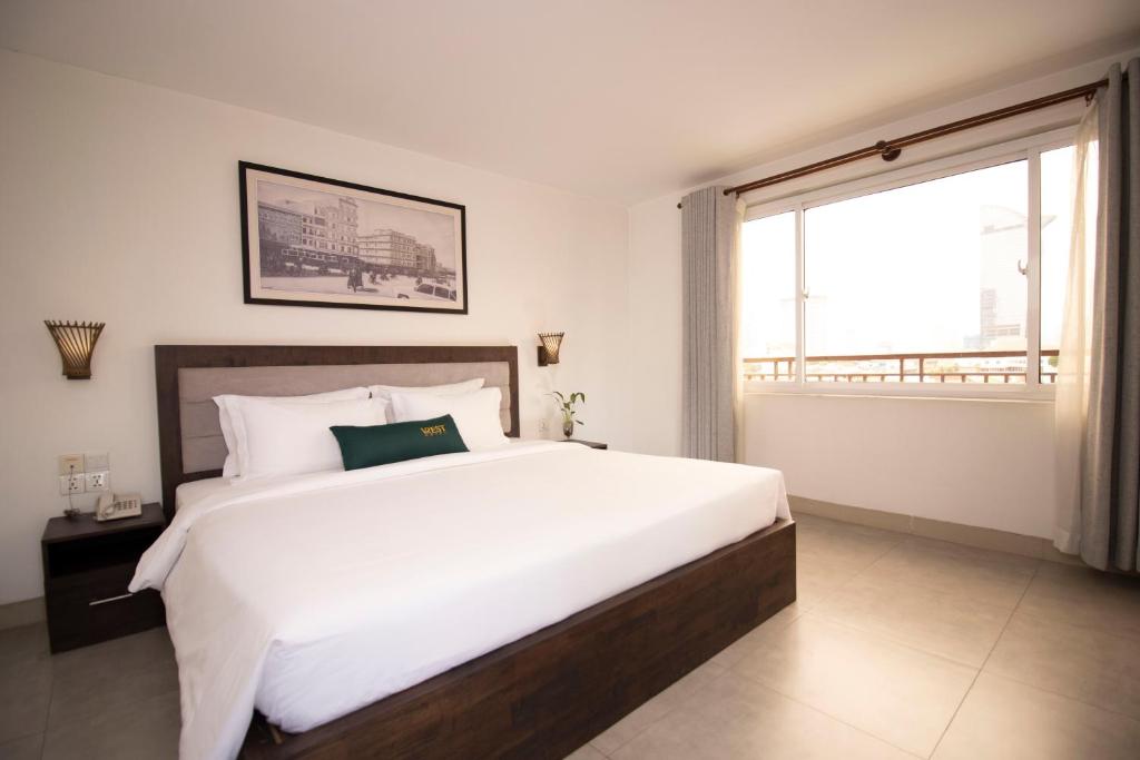 Postel nebo postele na pokoji v ubytování Vrest Hotel