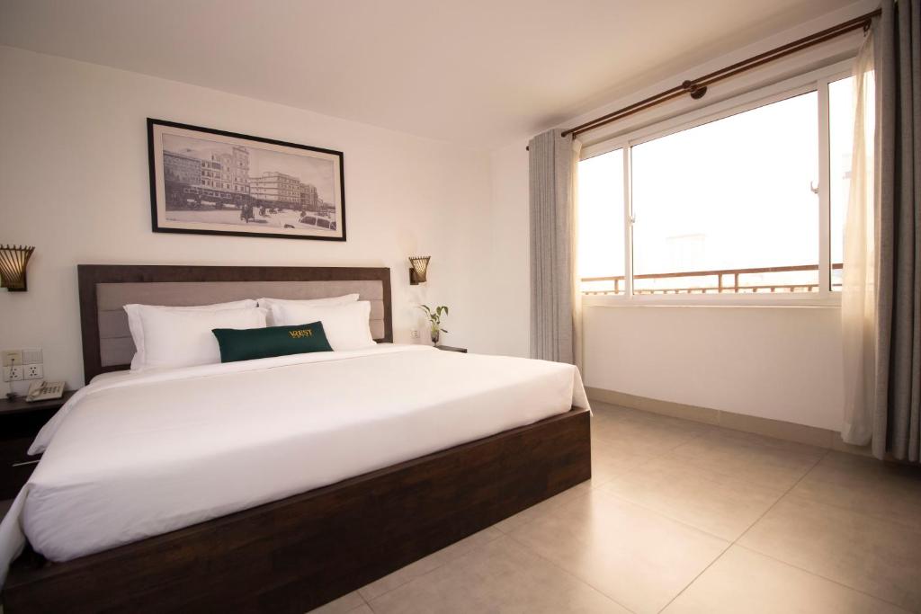 Postel nebo postele na pokoji v ubytování Vrest Hotel