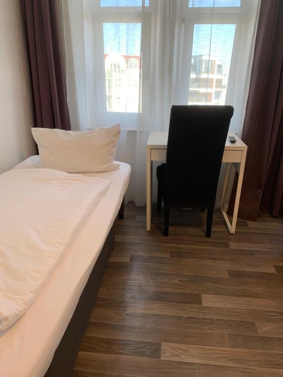 Postel nebo postele na pokoji v ubytování Hotel Bee Fang