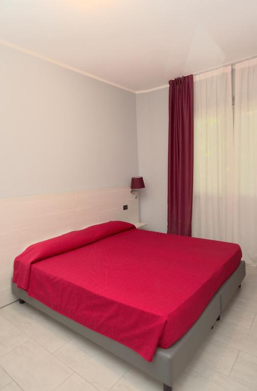 Łóżko lub łóżka w pokoju w obiekcie Hotel Pone