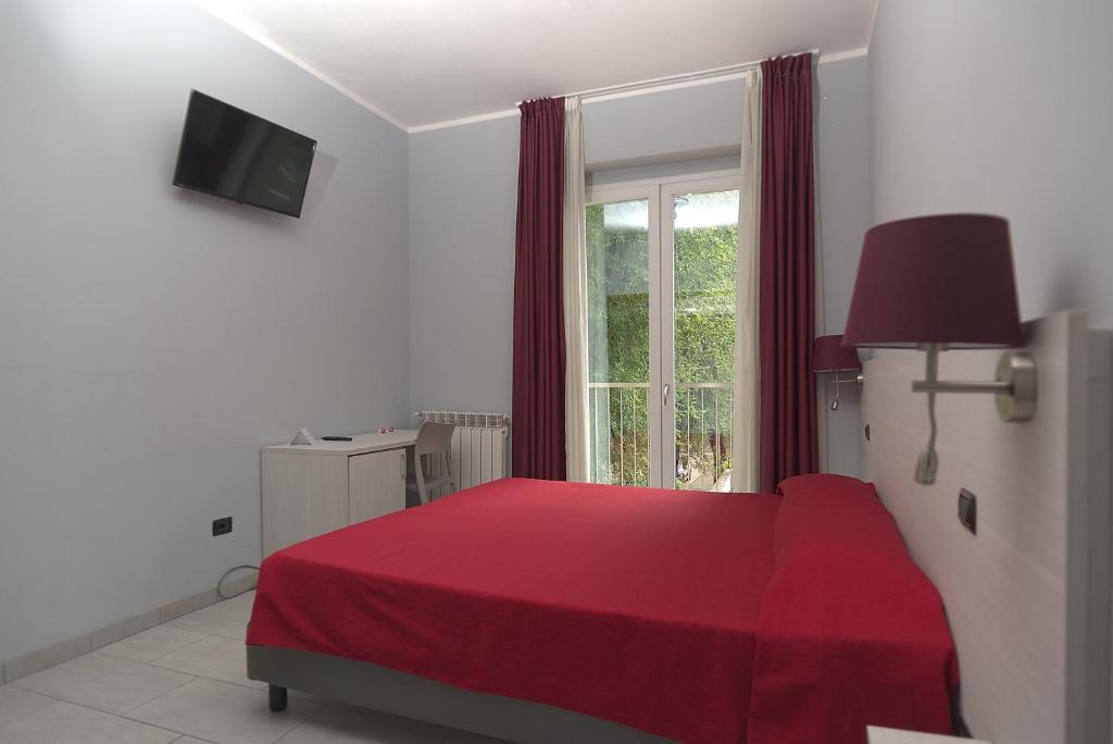 Łóżko lub łóżka w pokoju w obiekcie Hotel Pone