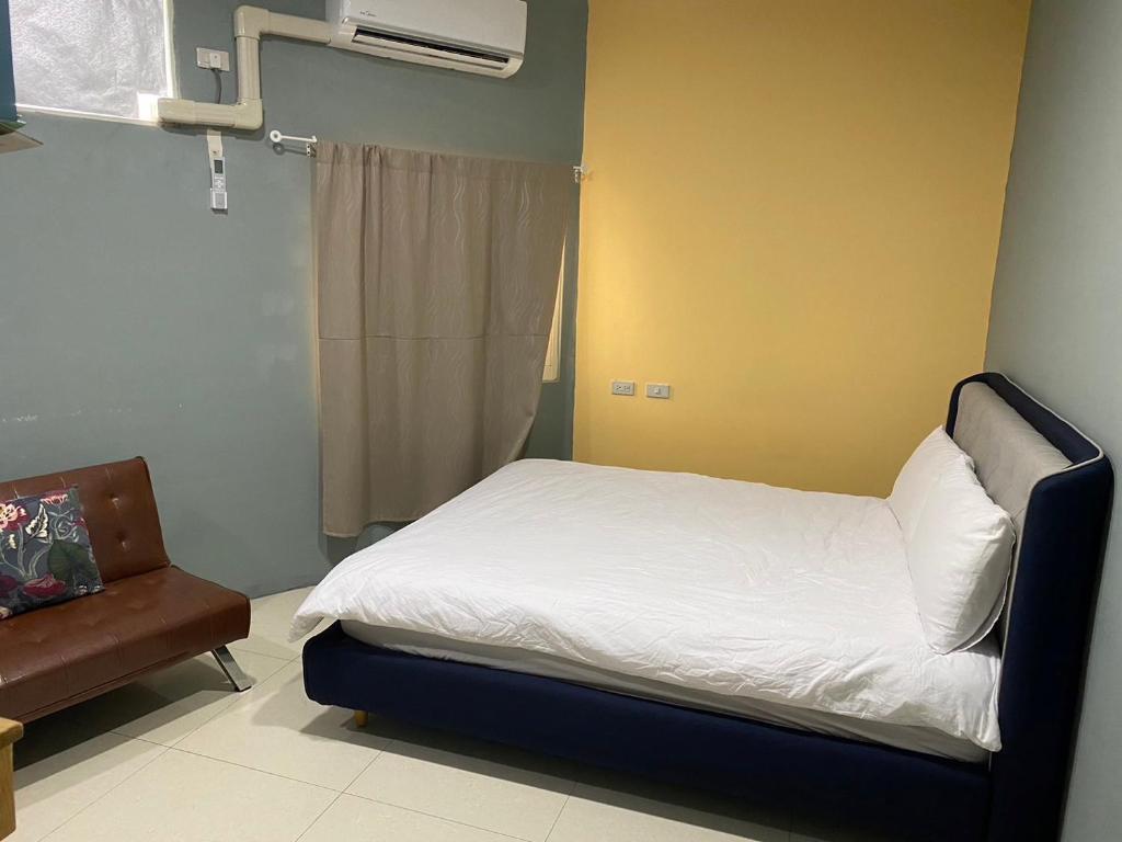 Postel nebo postele na pokoji v ubytování Luyu Homestay