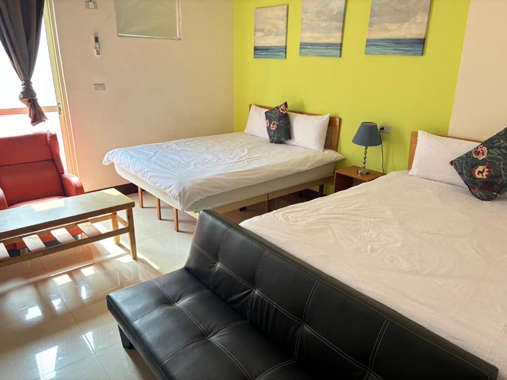 Postel nebo postele na pokoji v ubytování Luyu Homestay