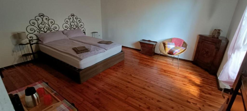 Postel nebo postele na pokoji v ubytování Antico Albergo di Cavaglia Sterna