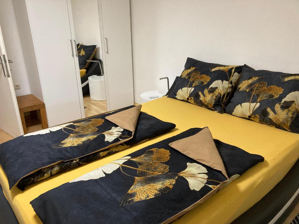 Posteľ alebo postele v izbe v ubytovaní Alpin-Check-in