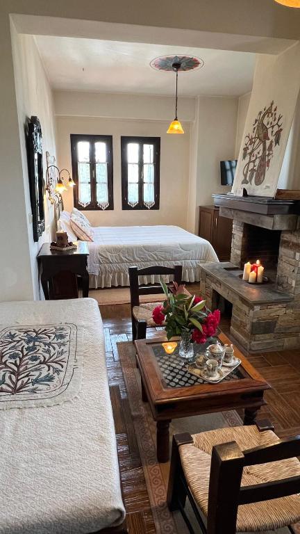 Postel nebo postele na pokoji v ubytování Guesthouse Filokalia